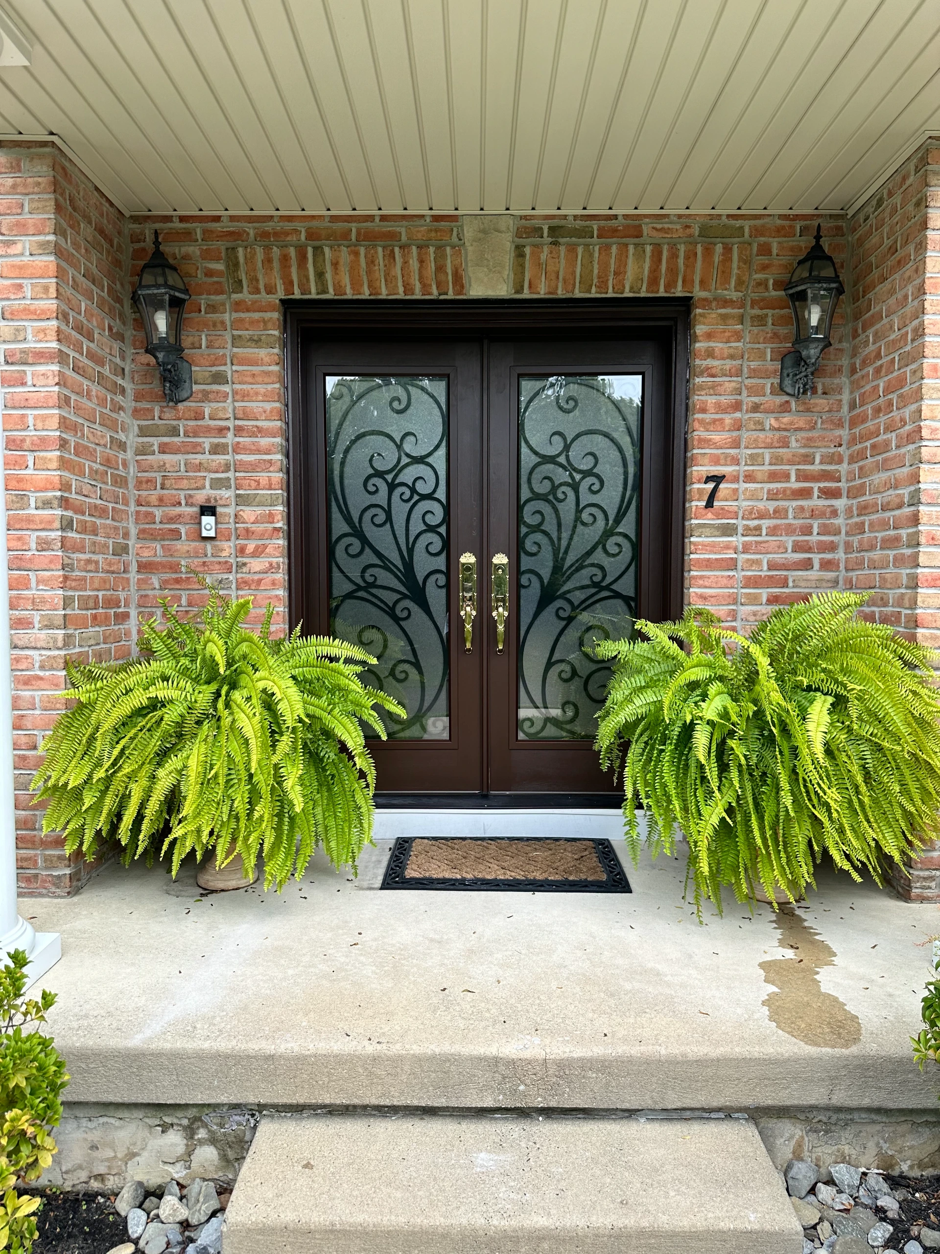 Double entry doors with ornamental glass